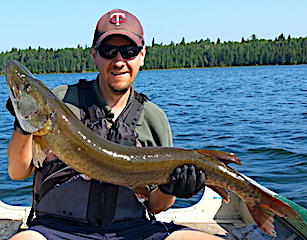 BIG 40-inch Muskie on Bull Dog Fishing by Robert at Fireside Lodge in Canada